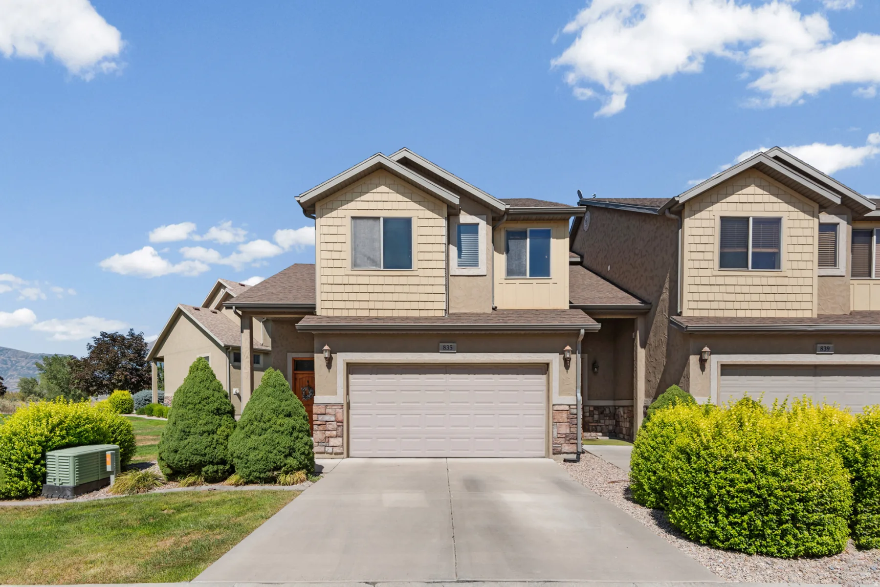 Angled exterior view of the end-unit townhome