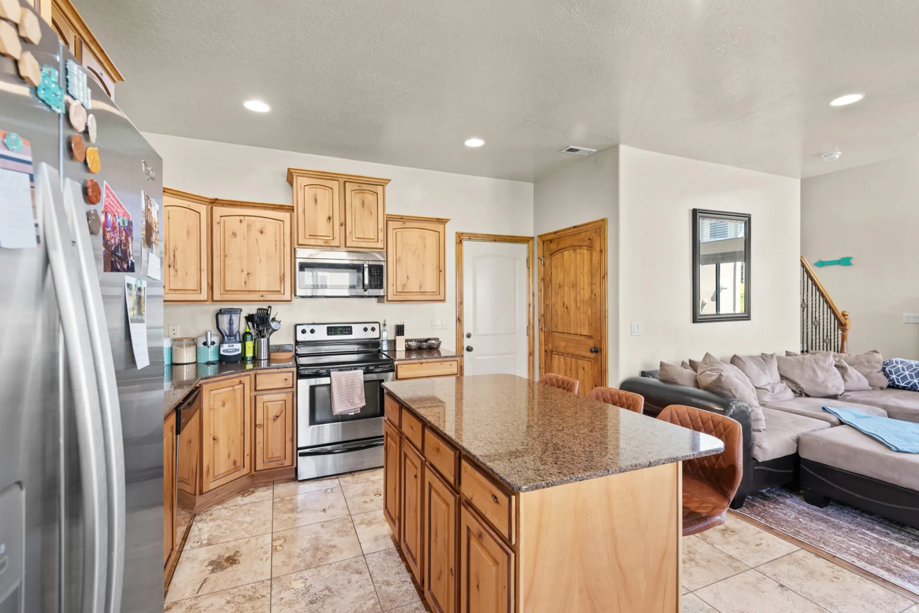 Kitchen with granite countertops and stainless-steel appliances