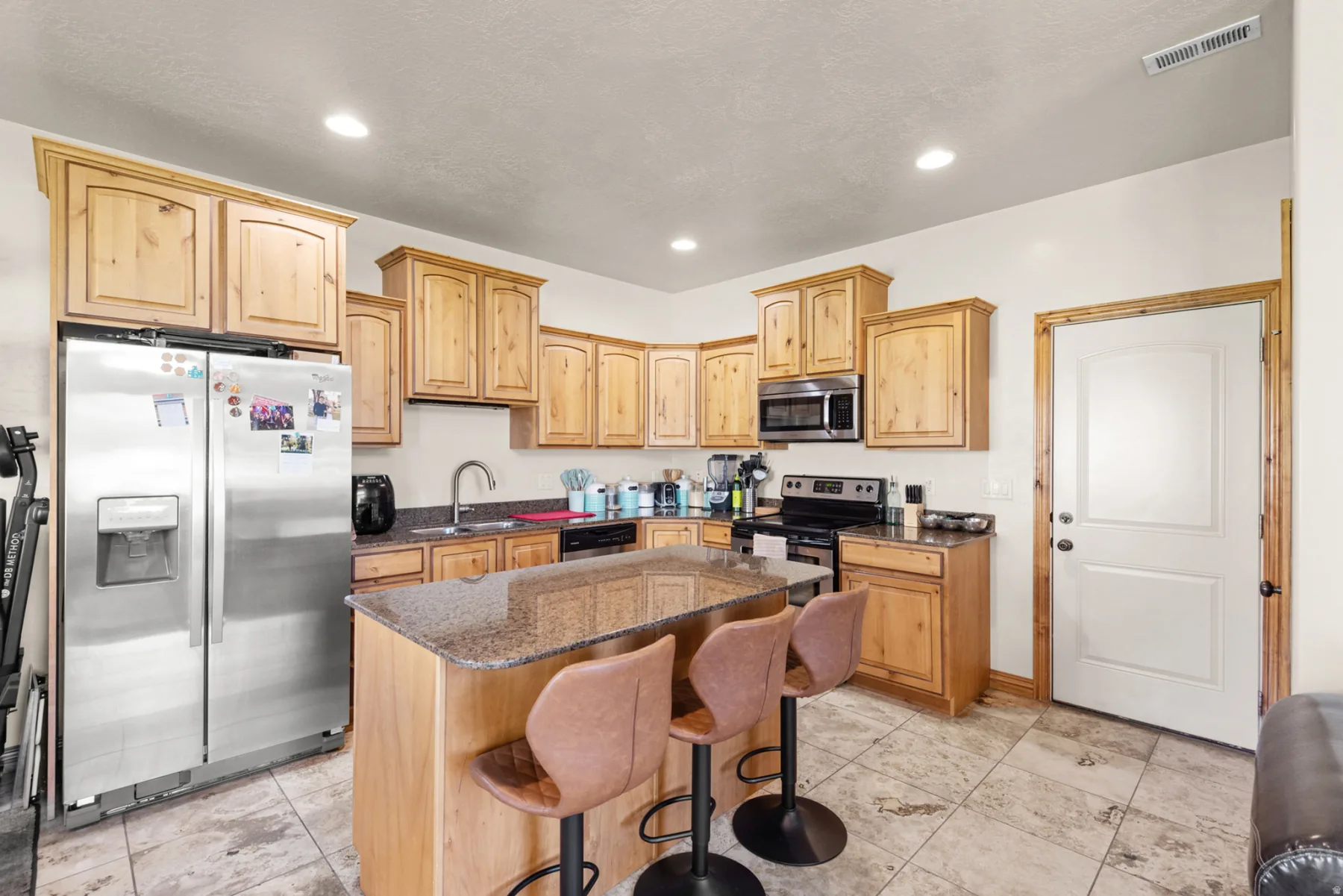 Kitchen with stainless-steel appliances